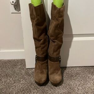 Double sole brown knee length boots with one gold buckle
